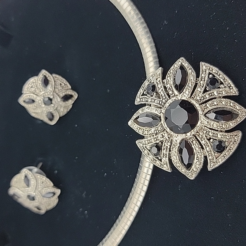 Suite of silver and black onyx
